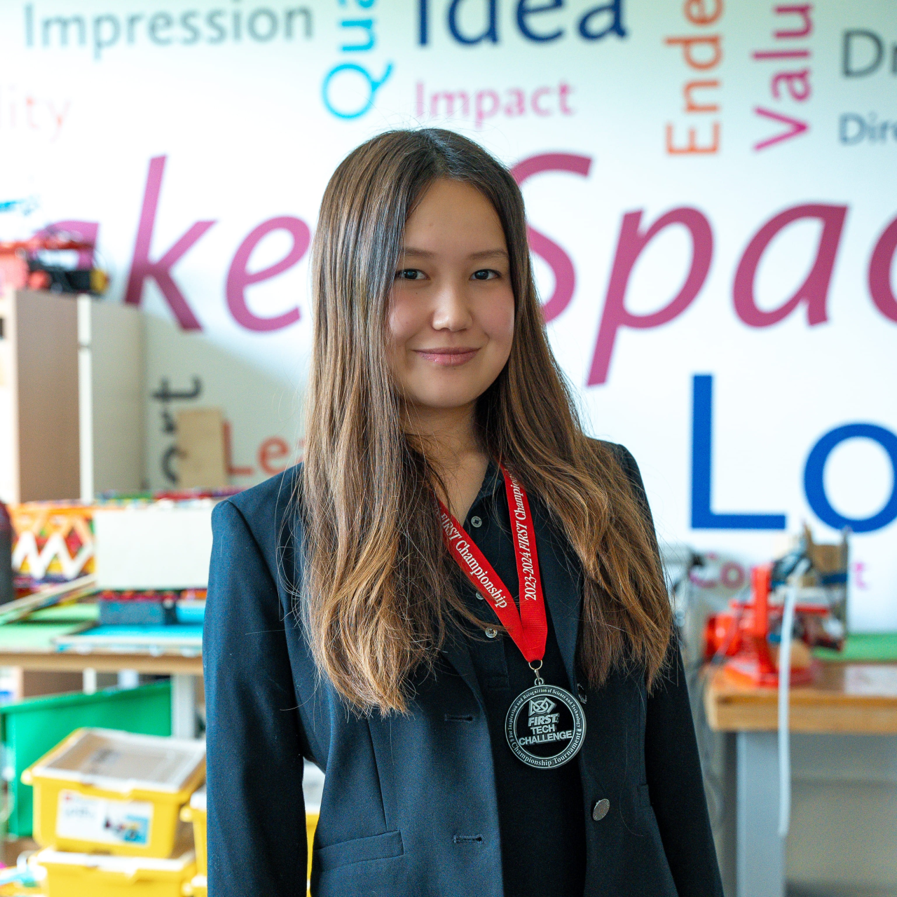 Year 12 Student Amina Shines at FIRST Robotics Championship in Texas